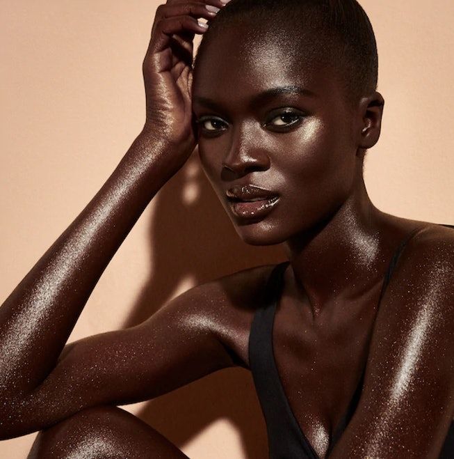 Body Shimmer on Deeper Skin Dark Skin 2022 Makeup Trends