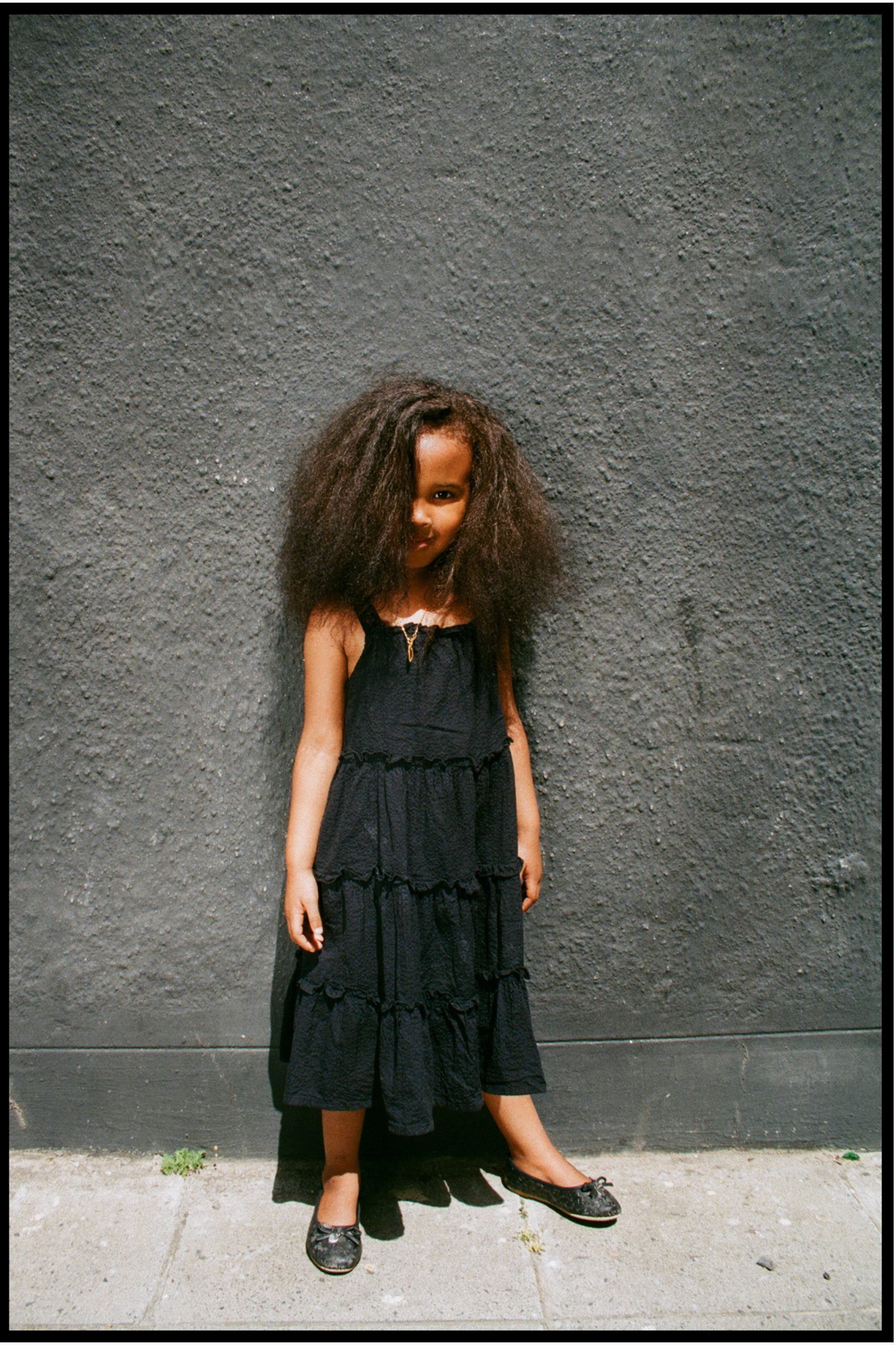 Heaven Lies At Thy Mothers Feet bu Faatimah Allie and Ya’eesh Dollie 4_Little girl in black with long kinky hair